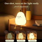 Children's night light in the shape of a pear.